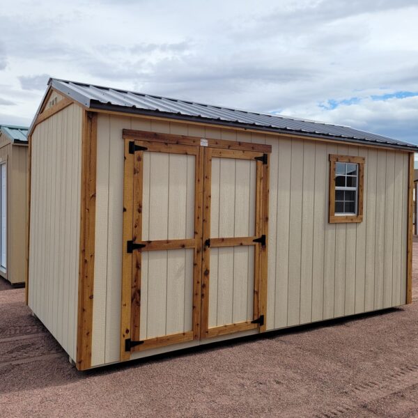 Front view double doors gable shed tan walls with window