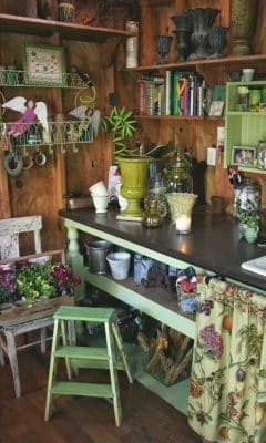 A storage shed used as a potters dream "green thumb" shed.