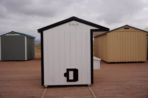Chicken Coop 6x8 perfect for raising chickens, viewed from the side, showing the chicken door.