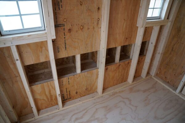 Chicken Coop 6x8 perfect for raising chickens, viewed from the inside, showing the nesting boxes on the side.