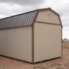 10x16 Barn Style storage shed with double doors and two windows viewed from the back corner.