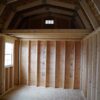 Interior view of the 10x16 Barn Style storage shed showing a loft for additional storage space.