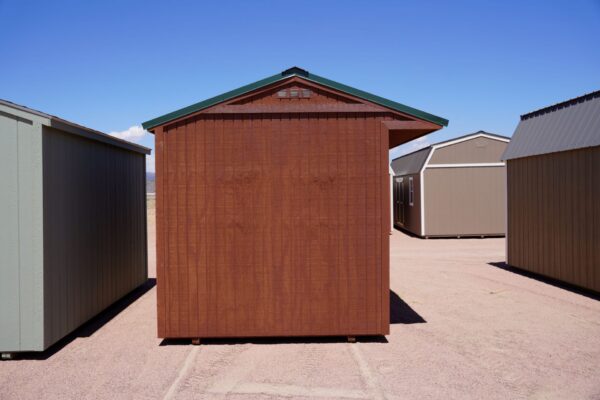 Tackroom Style 8x12 storage shed with wood siding viewed from the left side.