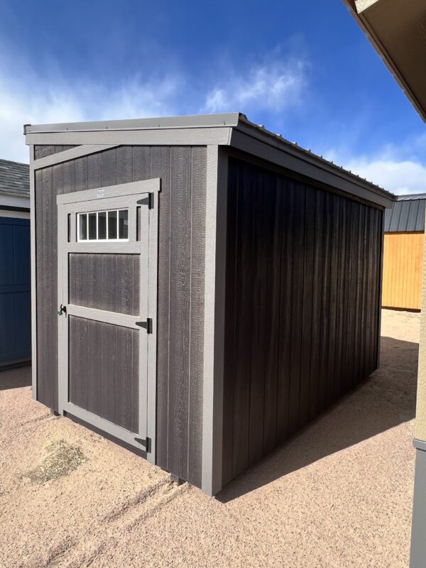A view from the right corner of the 8x12 Urban Style storage shed, showing the back as well.
