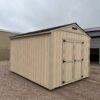 A large container sits outdoors in a sky filled with clouds.
