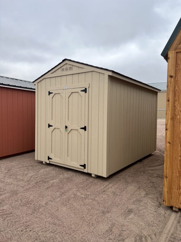 The sky is dotted with clouds as a wooden door opens to the outdoor world.