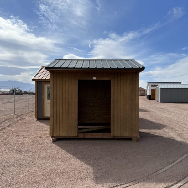 Experience the spacious design of our 8x10 Loafing storage shed as you view it from the front, highlighting the open front space that provides easy access and flexibility for your storage needs. This unique feature allows for convenient loading and unloading, making organization a breeze.