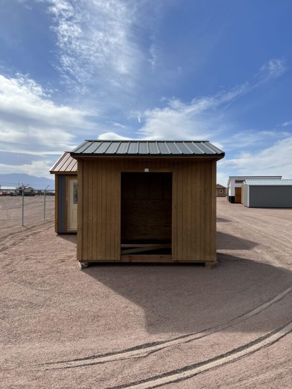 Experience the spacious design of our 8x10 Loafing storage shed as you view it from the front, highlighting the open front space that provides easy access and flexibility for your storage needs. This unique feature allows for convenient loading and unloading, making organization a breeze.