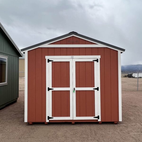 Gable Style 10x16 storage shed with double swinging doors. Red walls and white trim