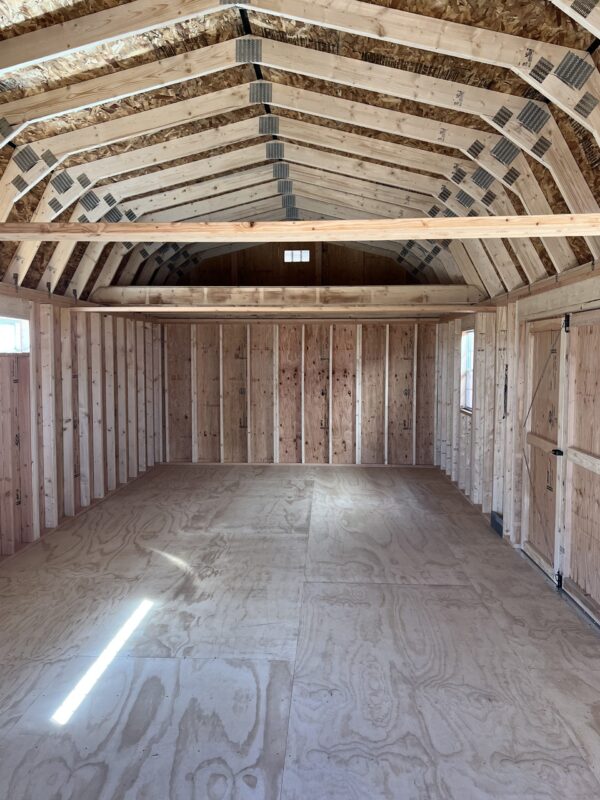 Take a step back and appreciate the considerable interior of our 14x32 Barn Style storage shed, which offers ample space for all your storage needs. The wide expanse ensures efficient organization and provides you with enough room to accommodate your belongings comfortably. Experience the convenience and functionality that this spacious storage solution provides.
