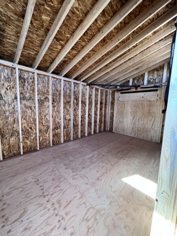 Step inside the spacious interior of the 10x20 Royal Gorge Style storage shed and behold a world of organized possibilities. With ample room to accommodate your storage needs, this shed offers a clean and well-designed space for all your belongings.