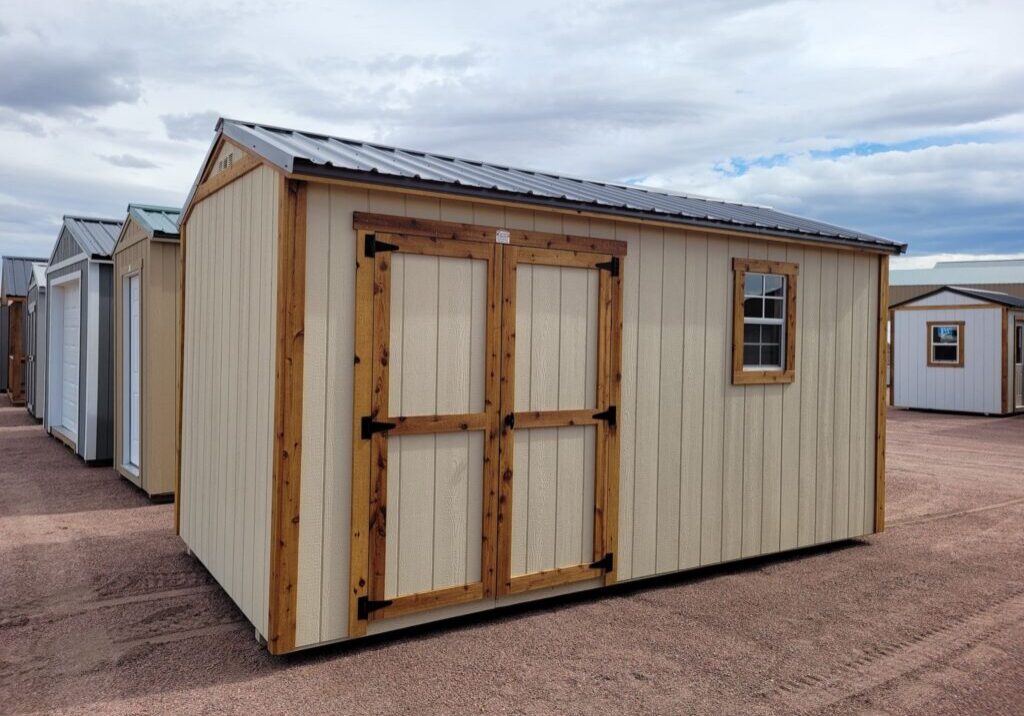 Front view double doors gable shed tan walls with window
